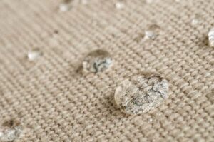 Flooded living room in Las Vegas NV showing carpet and hardwood floor damag