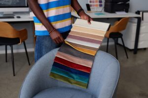 Upholstery cleaning expert in Las Vegas demonstrating safe methods for various fabric types